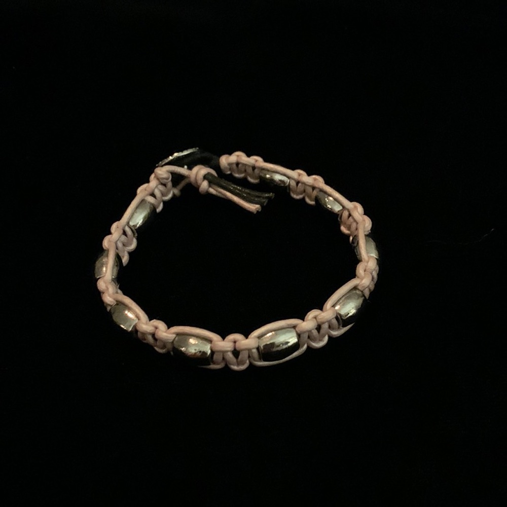 Beautiful pink leather silver beaded macrame bracelet.  Handmade boho  7”